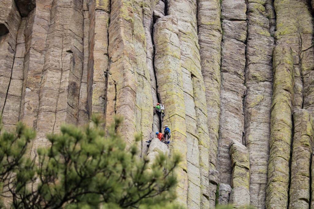 Rock climbers climbing Devils Tower in Wyoming.