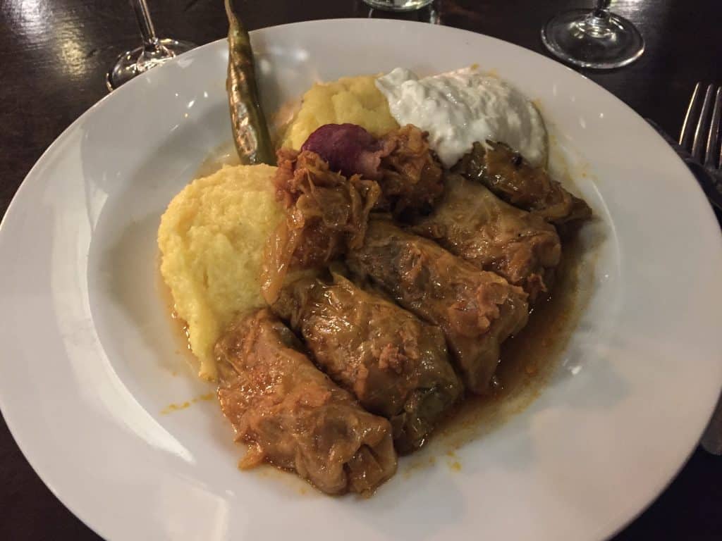 Delicious Romanian dinner of Sarmale which is cabbage rolls stuffed with minced meat.