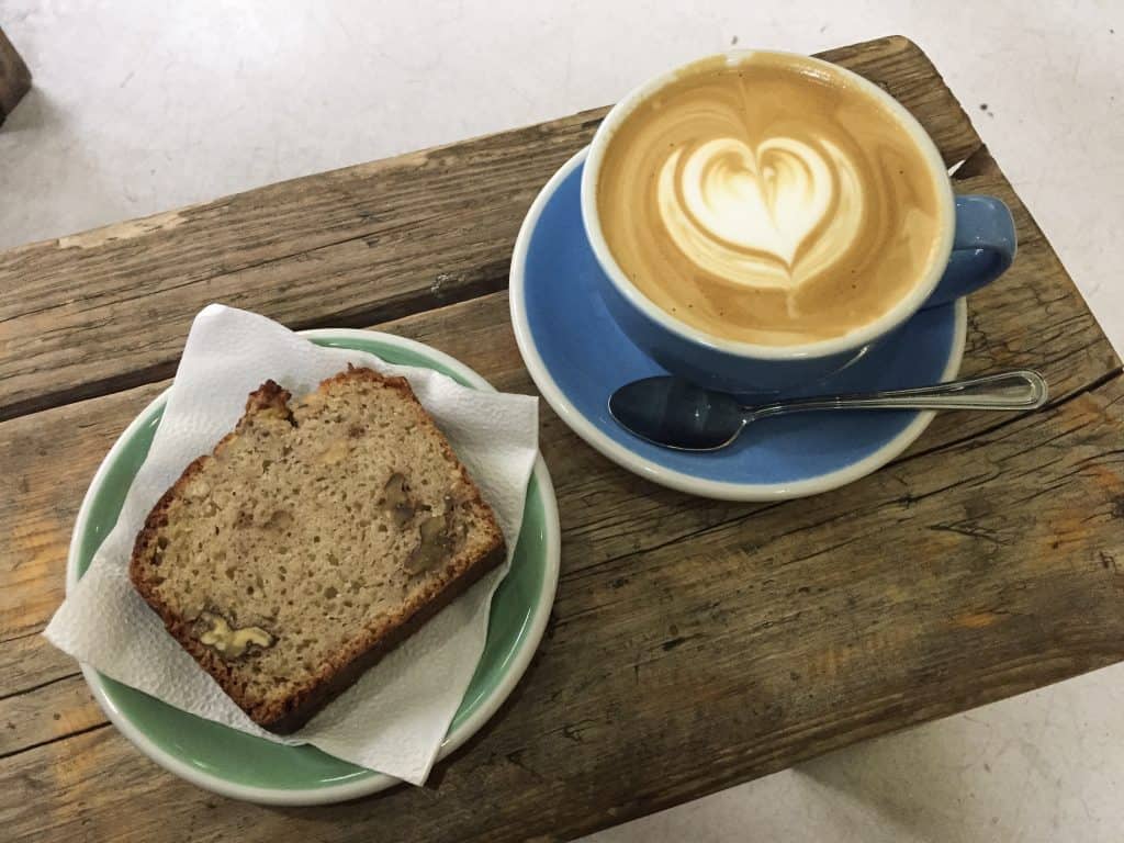Flat white coffee and banana bread at Steam Coffee Shop.
