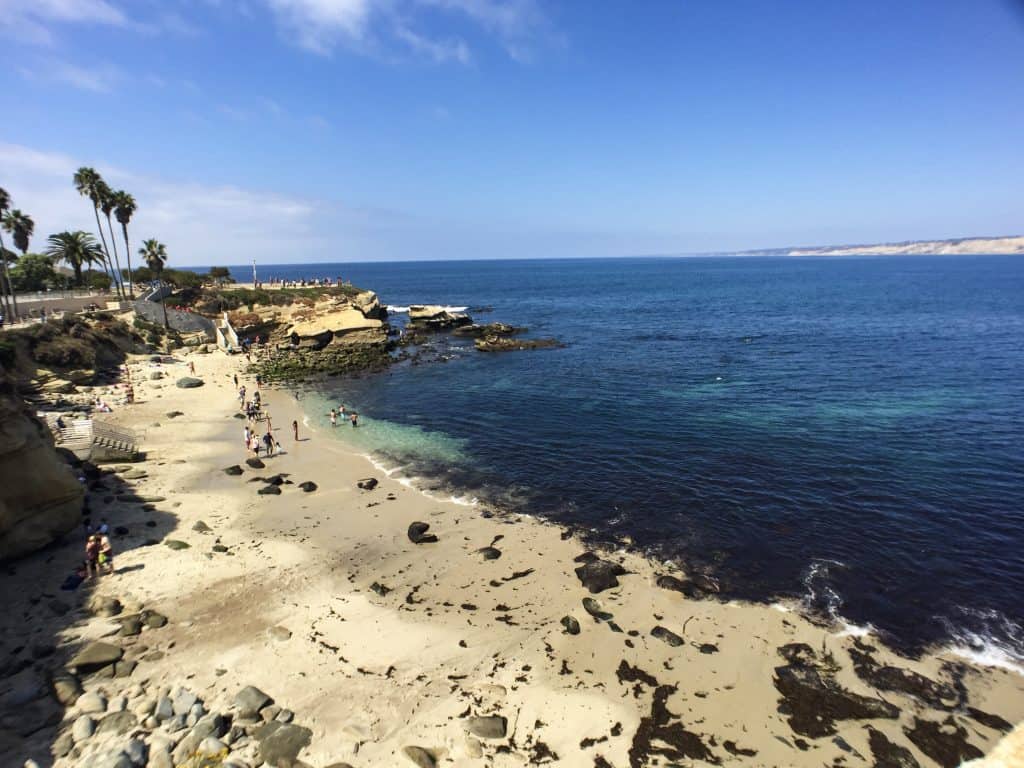 The gorgeous La Jolla Cove on a sunny day where you can swim, snorkel or kayak.