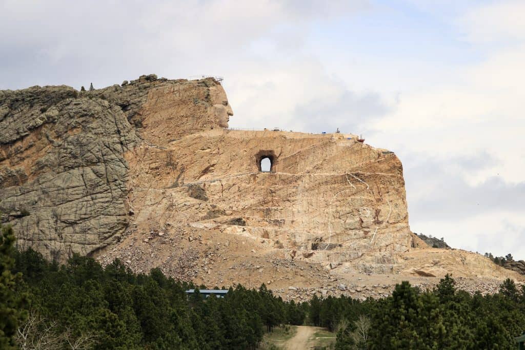 View of Crazy Horse Memorial in South Dakota. The largest mountain carving in progress.