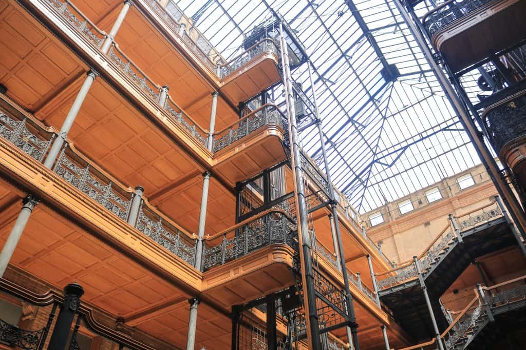 Detailed ironwork on rails, elevator and atrium of the Bradbury Building.