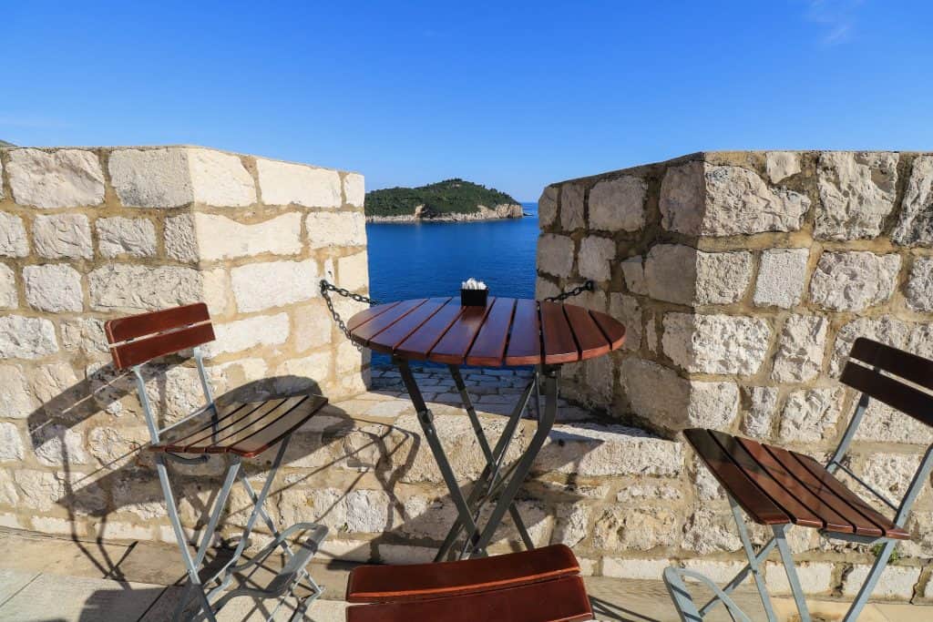 Table and chairs on the City Walls with view of Lokrum Island