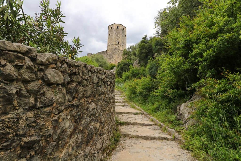 Walking up to the tower in the village of Pocitelj