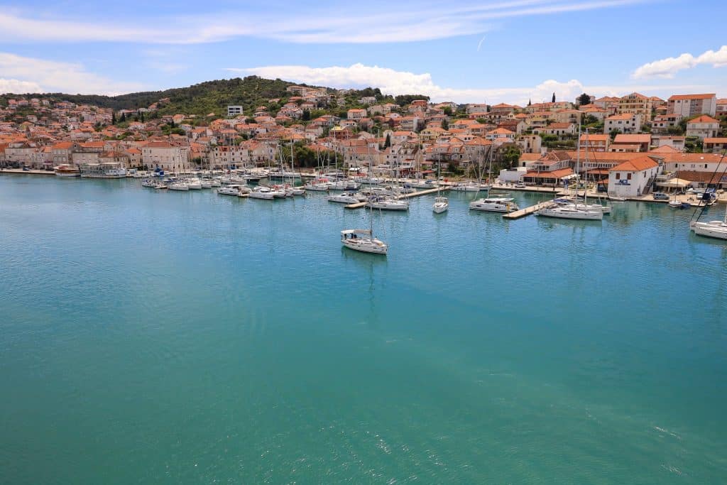 Boat sailing on the Adriatic Sea between Trogir and Ciovo islands.