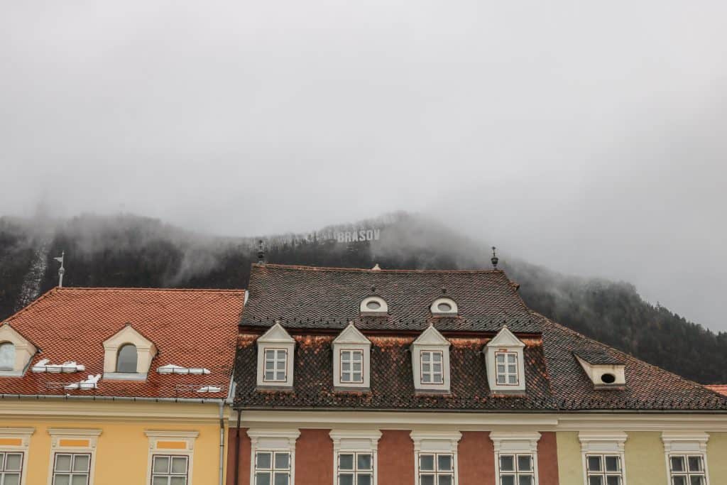 The "BRASOV" sign peeking through the fog...