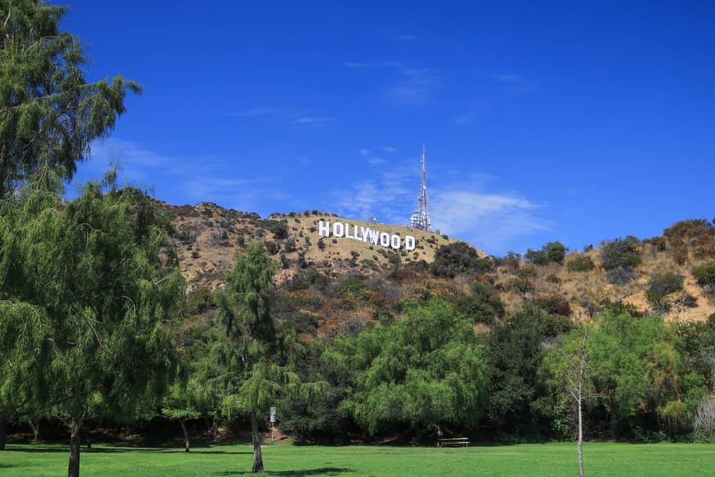 Lake Hollywood Park is a tranquil spot for a picnic on the grass below the Hollywood Sign.