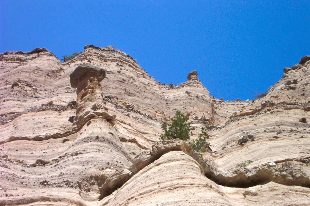 Cone-shaped tent rock formations at Tent Rocks National Monument outside of Santa Fe, New Mexico.
