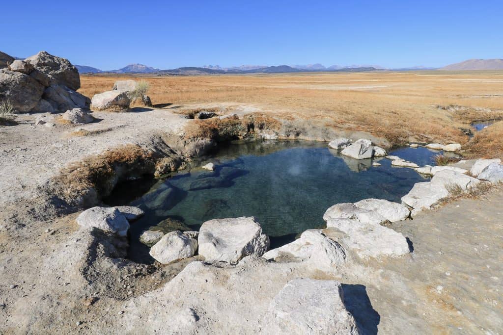 A close up view of the largest natural hot spring pool at Wild Willy's in Mammoth Lakes, California.