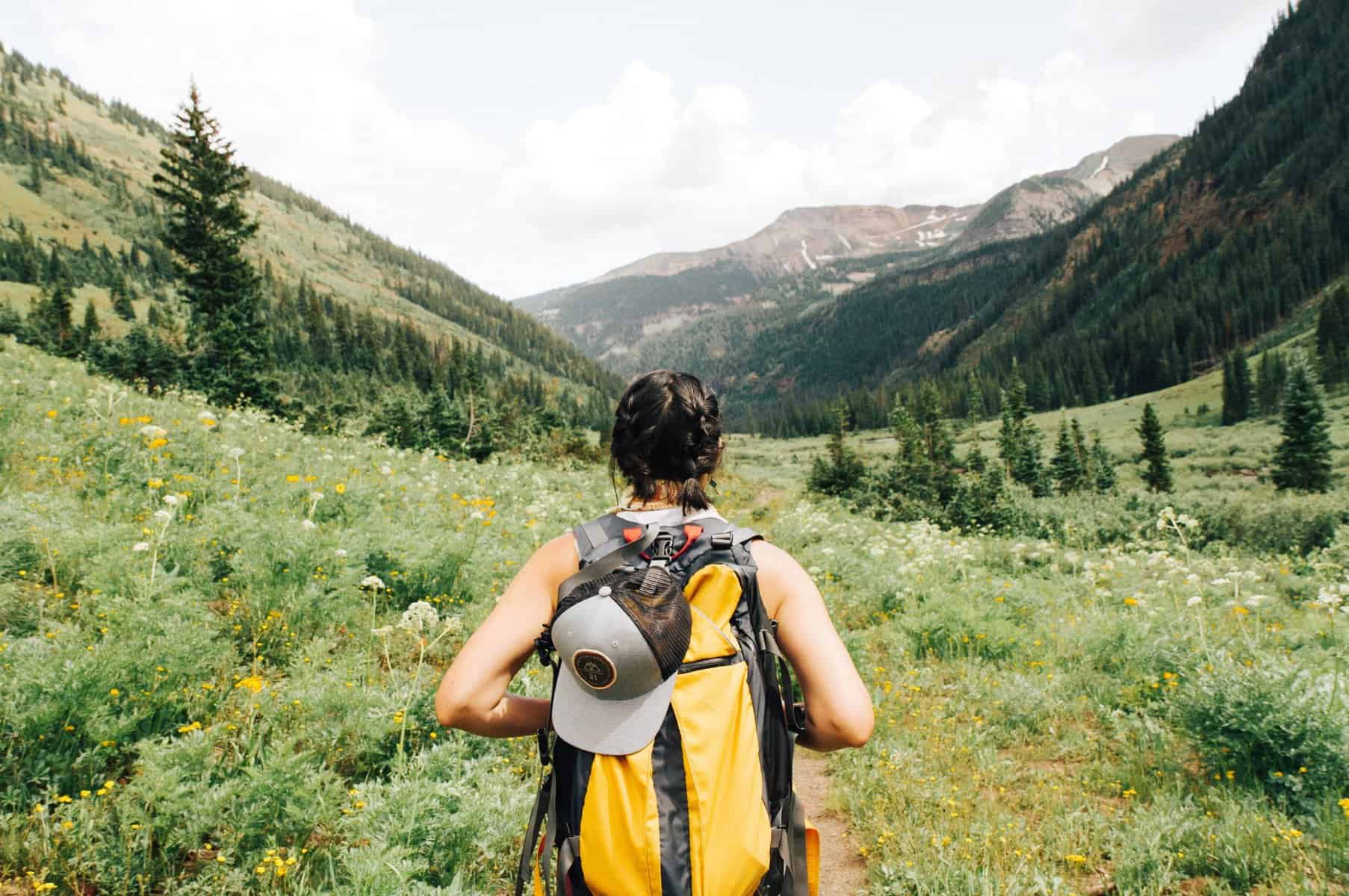 A women on a trail in nature by herself