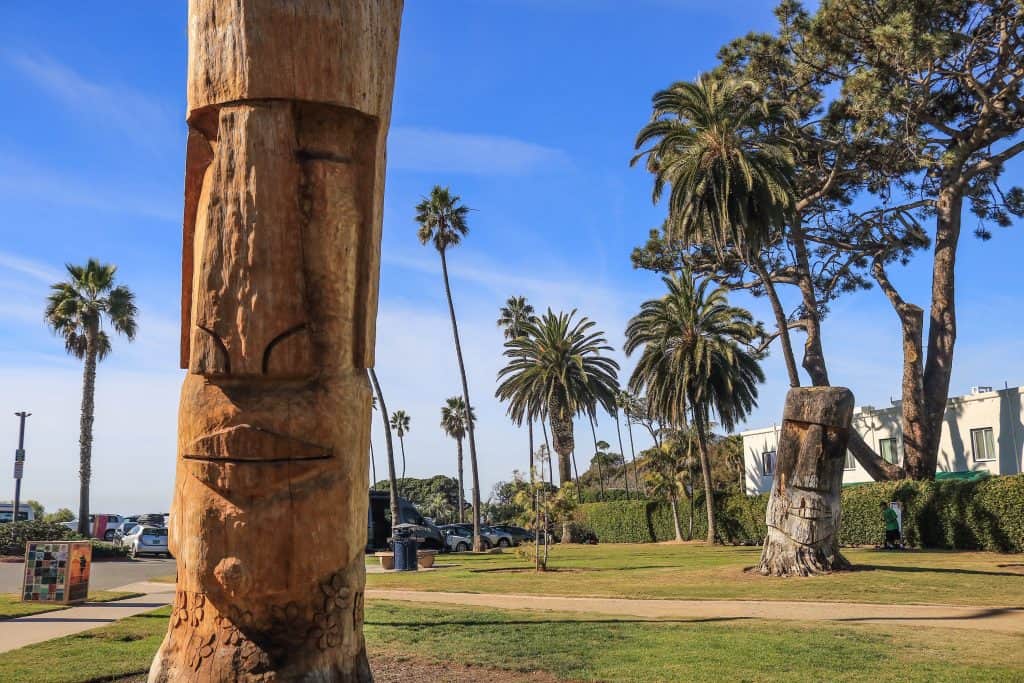 Tiki statues or Moai greet you as you visit Swami's
