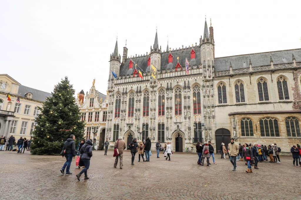 A Christmas tree in front of the gorgeous City Hall in Burg Square