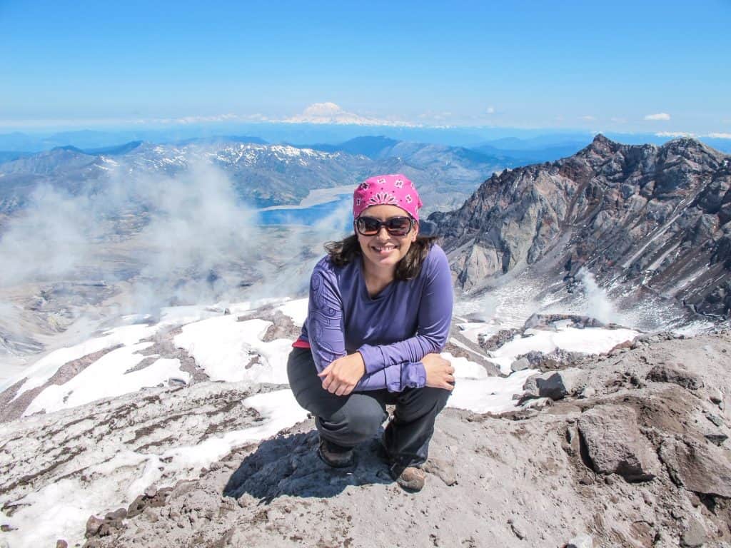 Me at the top of Mt. St. Helens and know from experience how many awesome gifts for hikers are on this list.