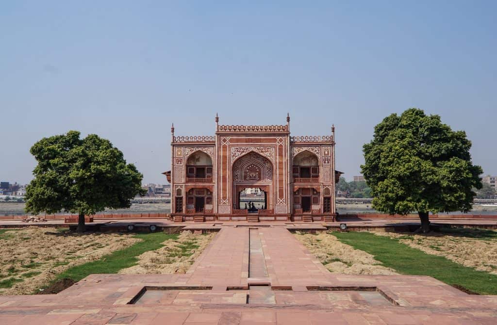 Looking out from Baby Taj to a red sandstone building in the complex