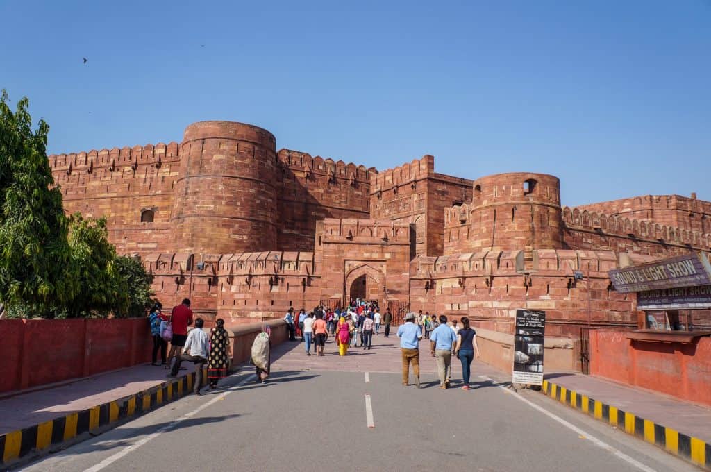 The front entrance of Agra Fort made of red sandstone and one of the top places of interest in Agra