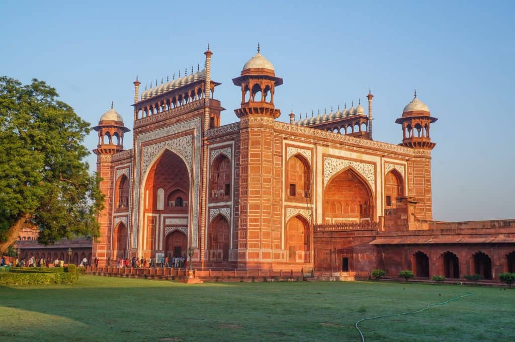 The red sandstone building and gate into seeing the Taj Mahal