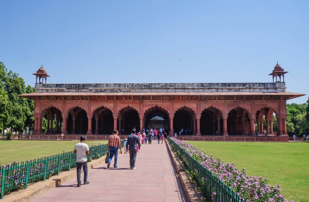 The Diwan-i-Am building in the Red Fort complex which is a series of red sandstone columns an intricate carvings