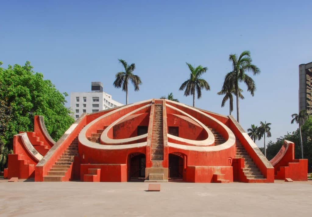A red stone structure that is a scientific tools used to determine time and find celestial objects and a popular sight to see during your 3 days in Delhi