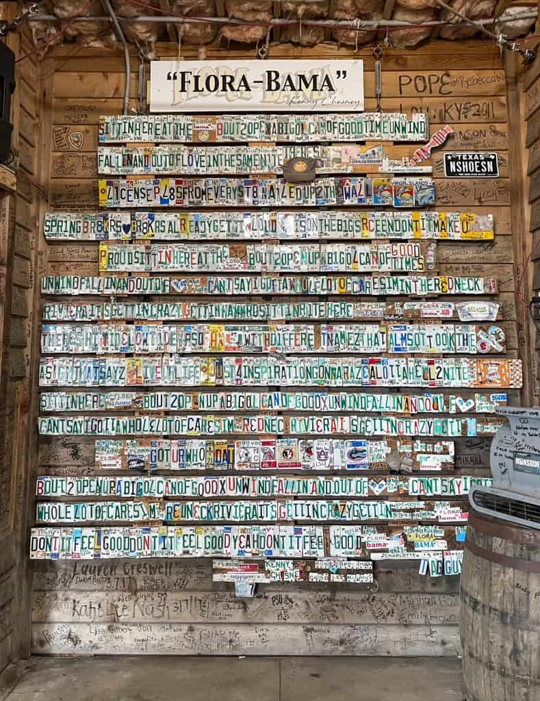 A license plate mural with the lyrics to the Flora-Bama song by Kenny Chesney at Flora-Bama bar.