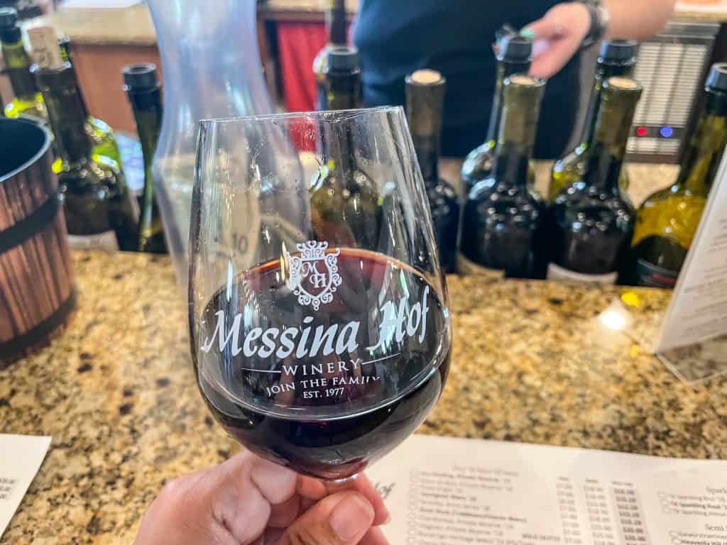 Wine tasting with a class of red Pinot Noir at Messina Hof Hill Country in Fredericksburg.