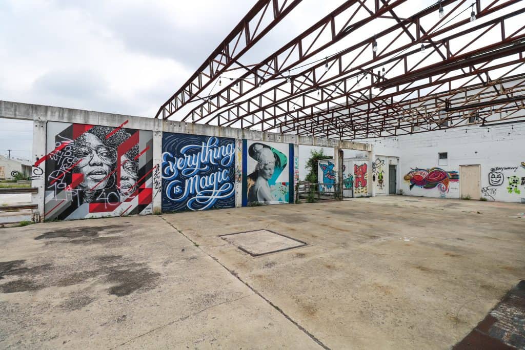 A row of fun art murals at the industrial Essex Modern City.