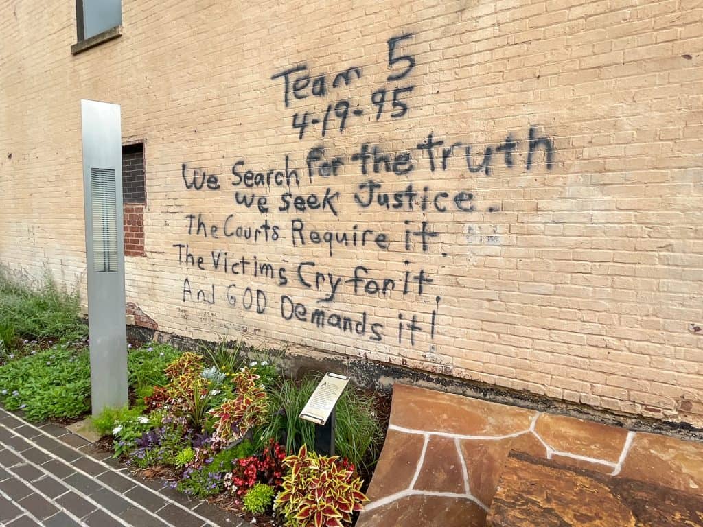 Quotes spray painted on the building on 4/19/1995 during rescue efforts.