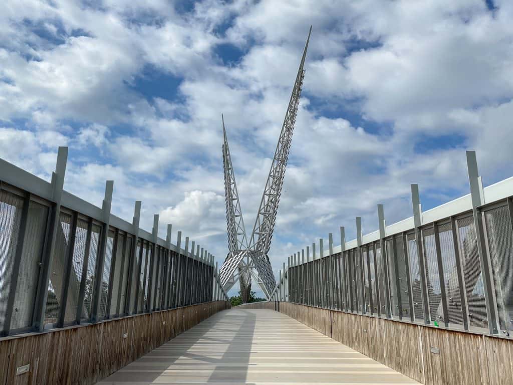 Walking across the stunning and cool architecture of the Skydance Bridge.