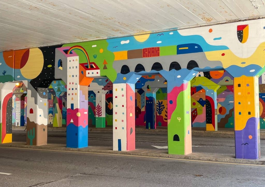 Colorful art mural paintings underneath the overpass going from downtown to Bricktown.