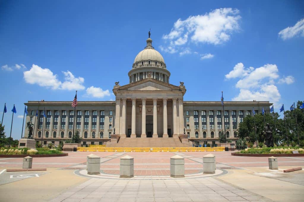 the front of the Oklahoma City State Capitol Building with a domed top.