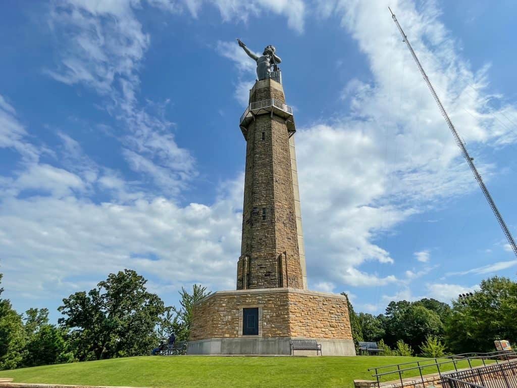 Looking up at the Vulcan statue on top of its pedestal.
