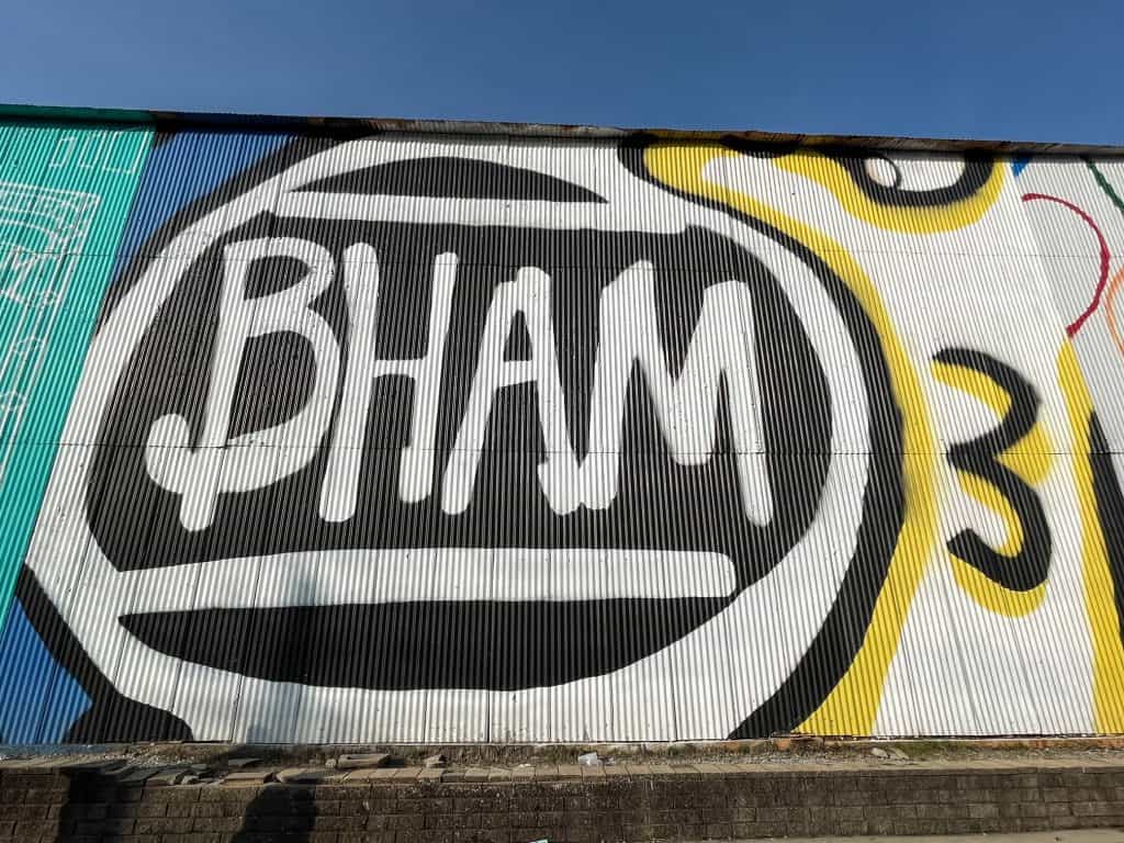 A black and white art mural with huge letters BHAM which is shorthand for Birmingham.