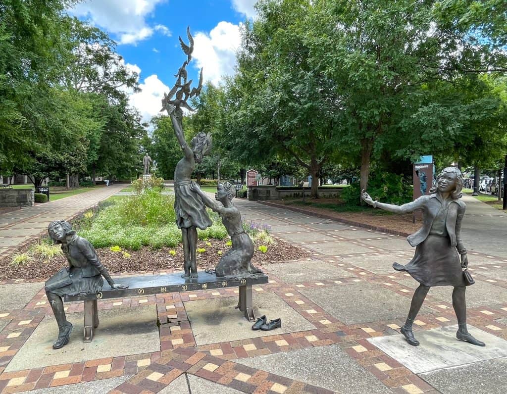 The Four Spirits sculpture showing 4 young girls playing.