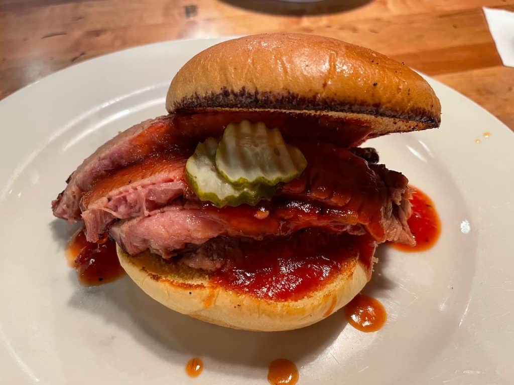 Excellent beef brisket sandwich with BBQ sauce at Jim N Nicks.