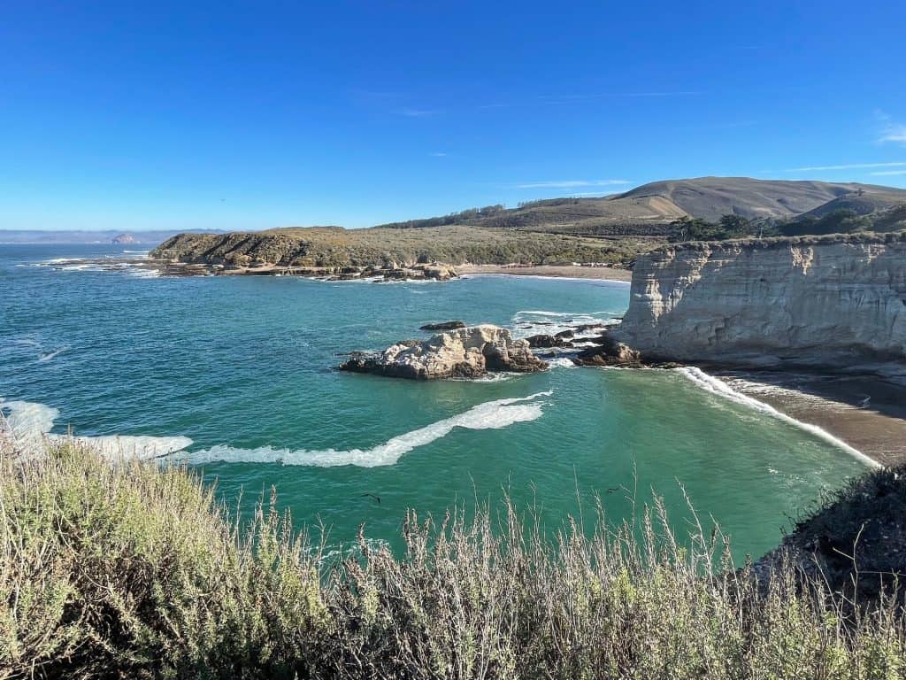 Looking out at the coastline along Montana de Oro, bluffs and turquoise water.