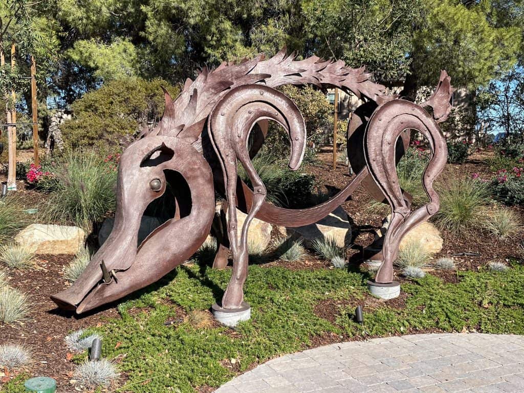 A beautiful and abstract metal sculpture of a boar.