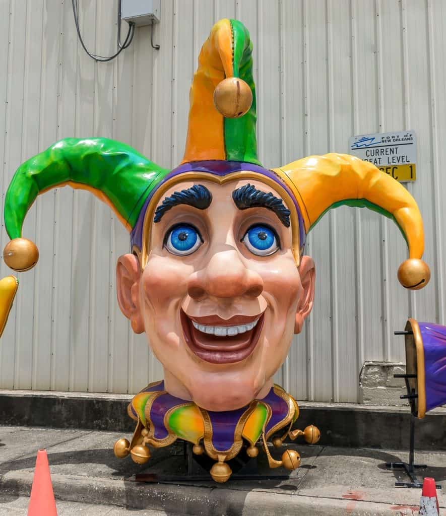 A huge head of a jester as part of a Mardi Gras float at Mardi Gras World museum in New Orleans.