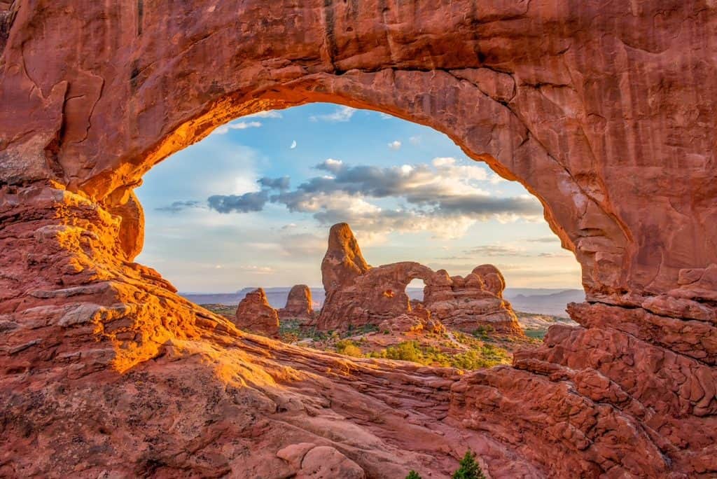 Turret arch through the North Window at Arches National Park in Utah is a park you can use your U.S. National Park Pass at.