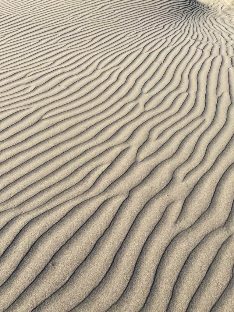 A close up view of the ripples in the sand dunes that looks almost perfect.