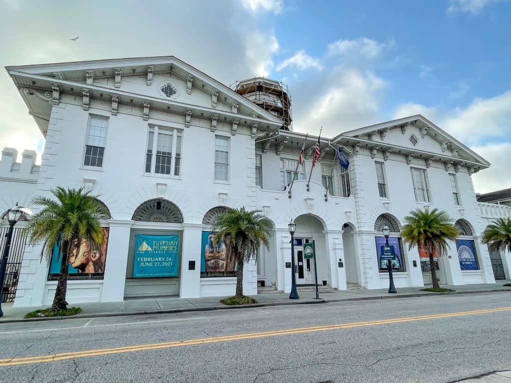 The beautiful white historic building that is now the History Museum of Mobile.