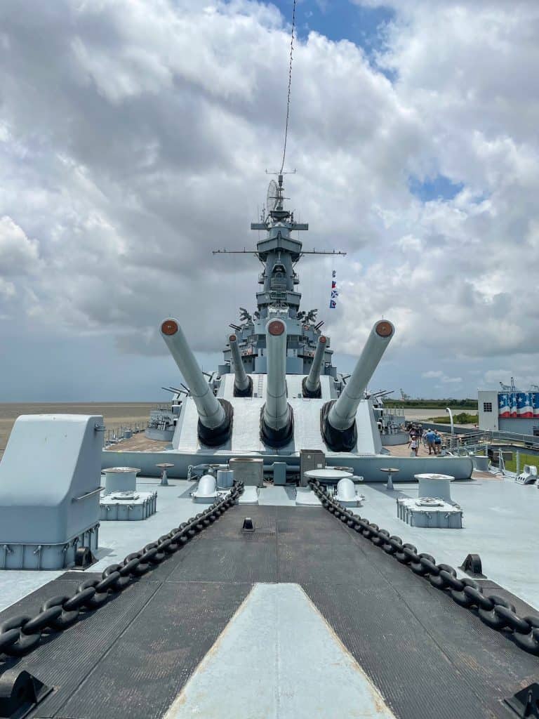Looking straight on at the huge guns off of the USS Alabama on the top deck.