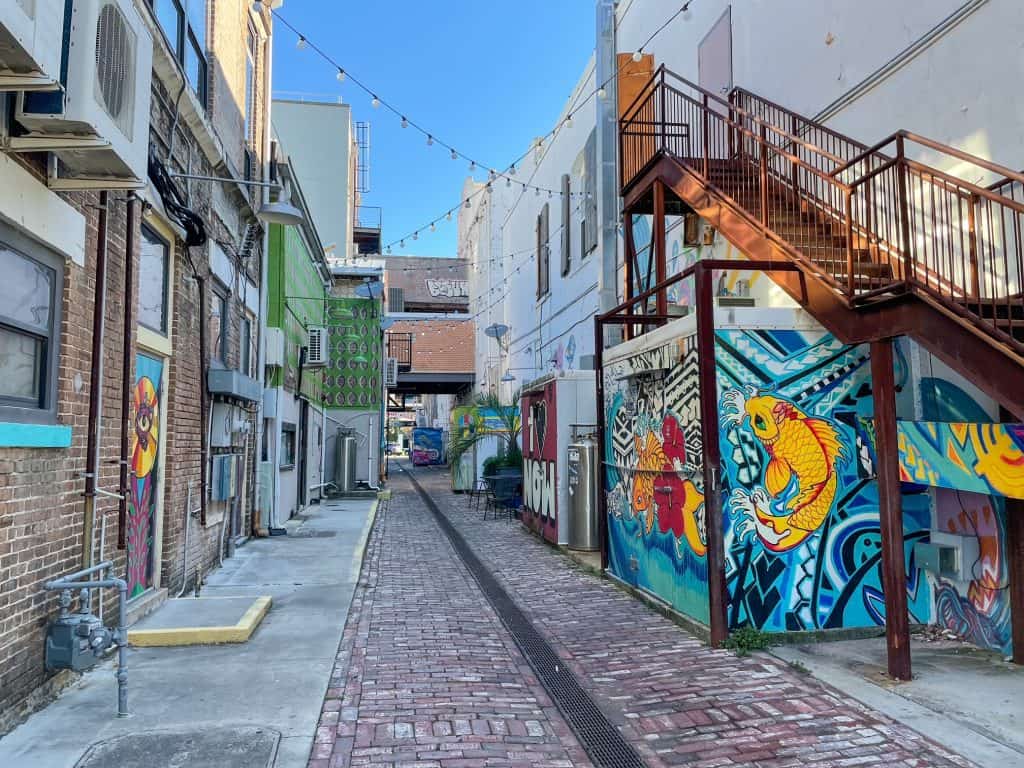 The bright and colorful art along each side of Fishbone Alley in downtown Gulfport, MS.