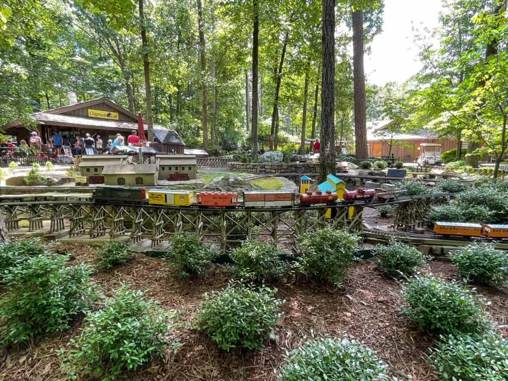 The charming train set that runs on a small track in front of Chipmunk Cafe.