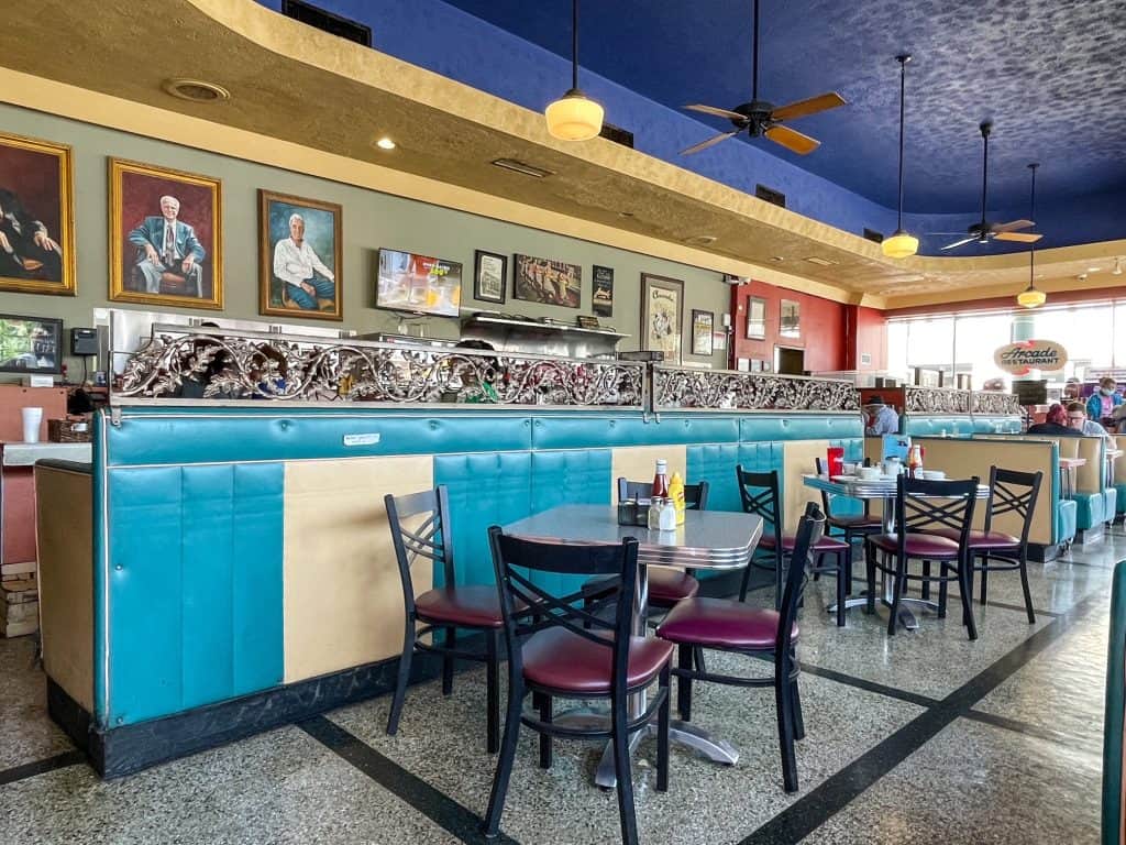 View of the Arcade diner from the booth that Elvis used to eat at with the restaurant having a colorful and vintage decor.