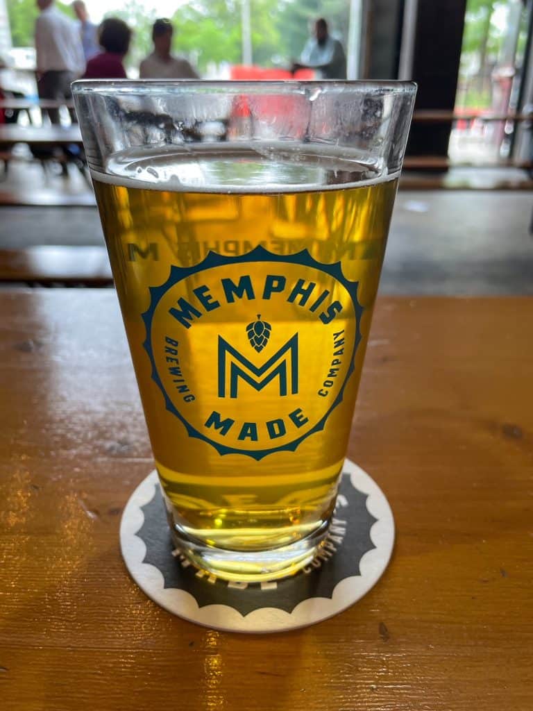 A pint of beer on a table at Memphis Made Brewing in Memphis is a great thing to try on a weekend in Memphis, TN.