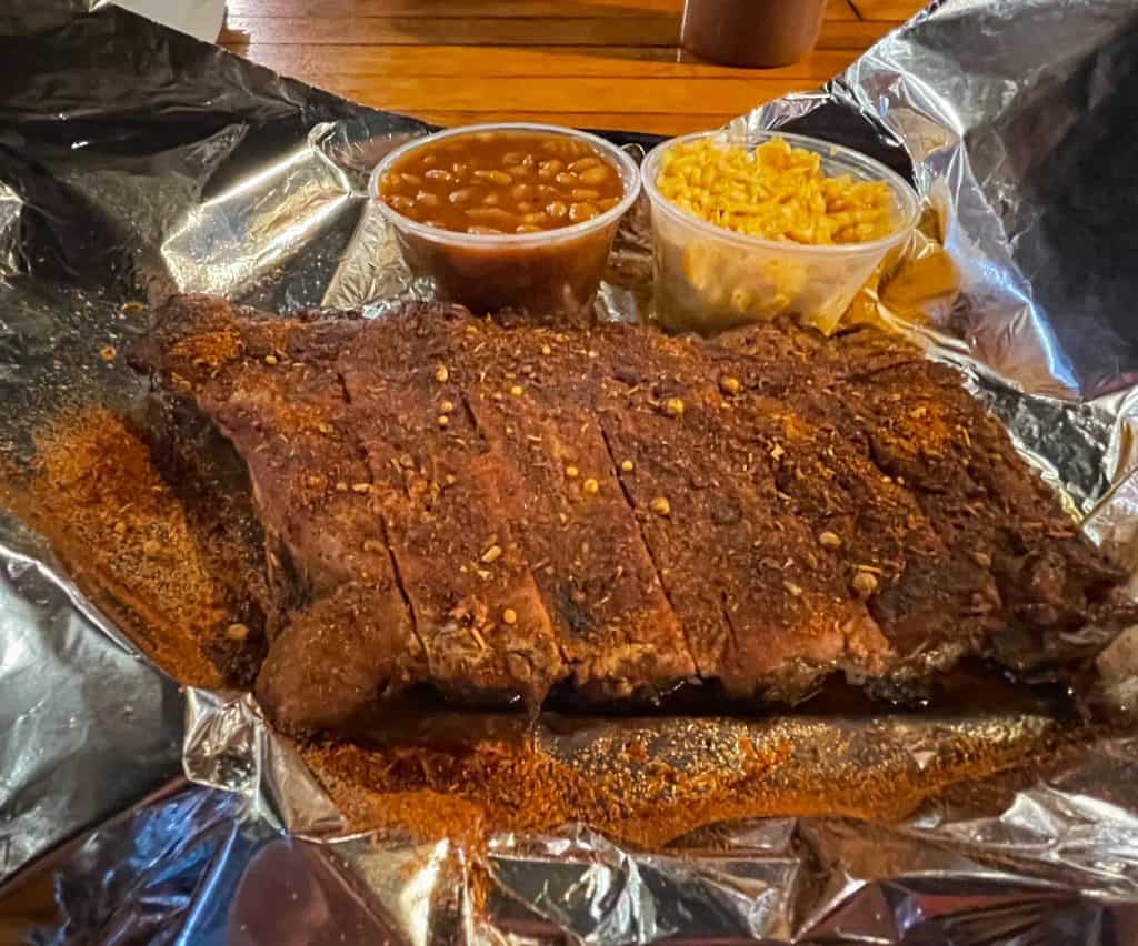 The tastiest pork ribs with a dry rub, coleslaw, and baked beans at Rendezvous in Memphis, Tennessee.