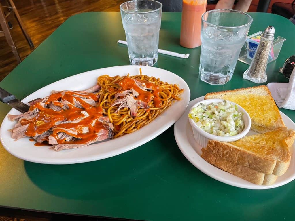 A plate of BBQ spaghetti, pulled pork, and Texas toast at The Bar-B-Q Shop in Memphis, TN.