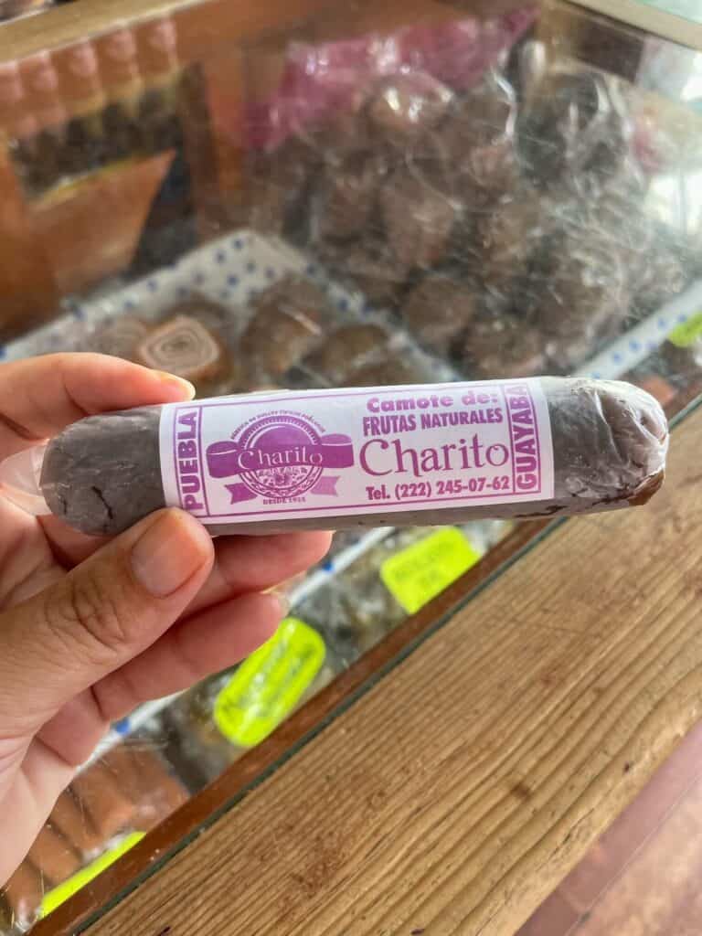 A cigar-shaped Camote made of sweet potatoes at a sweet shop on Calle de Dolce.