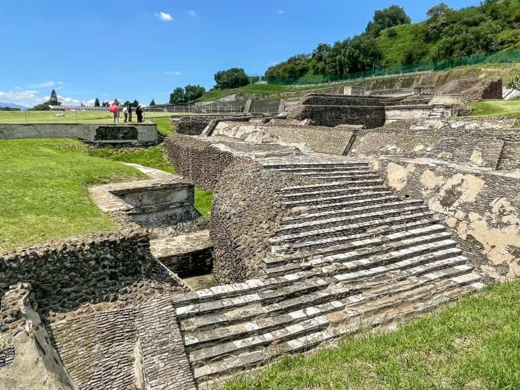 Viewing the many layers of stonework at the base of the Cholula pyramid, the largest in the world.