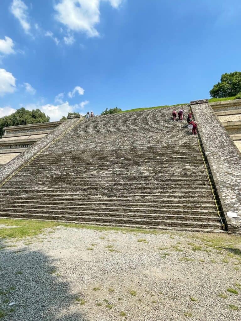 A section of the pyramid base that people can climb up holding a rope as it is very steep.