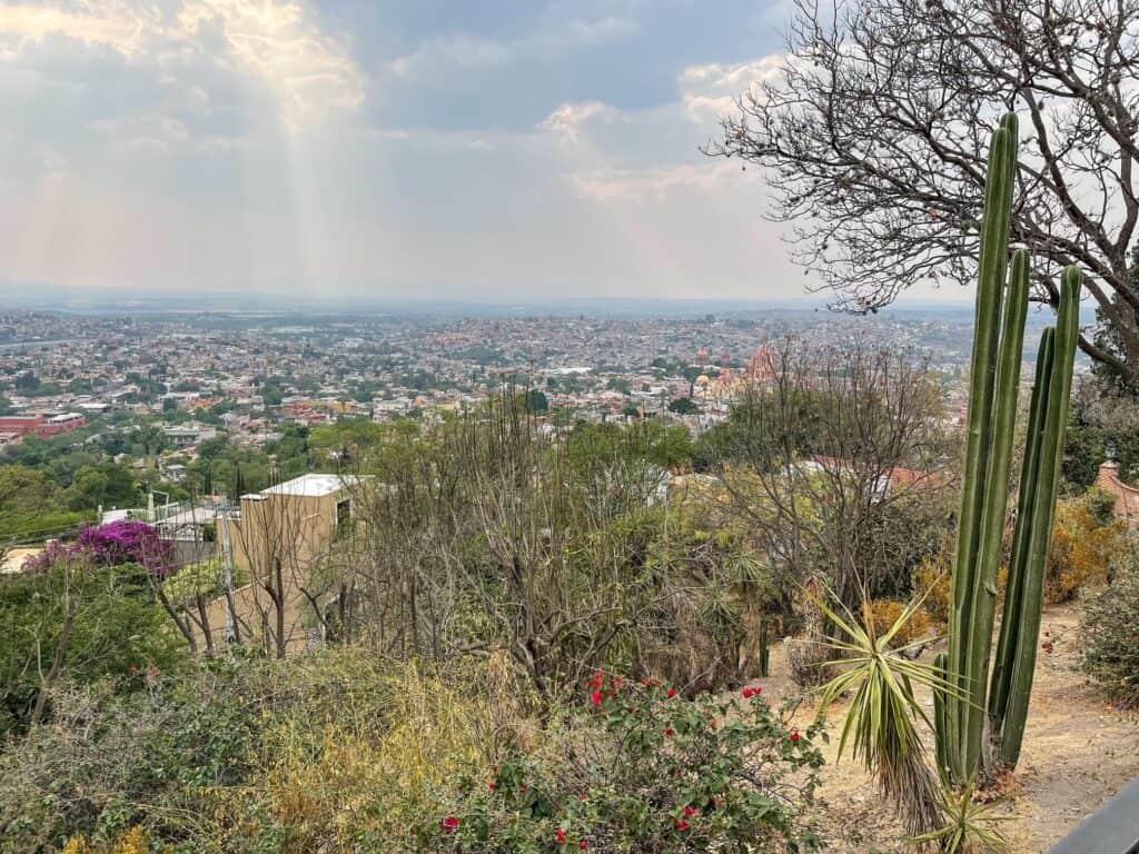 At the top of El Mirador viewpoint looking out at the entire city of San Miguel de Allende and its beautiful church towers.